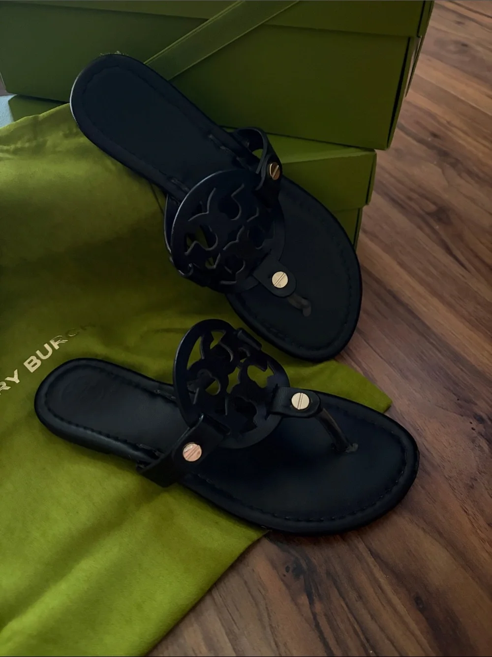Tory Burch Black Logo Cutout Thong Sandals with Gold Accents